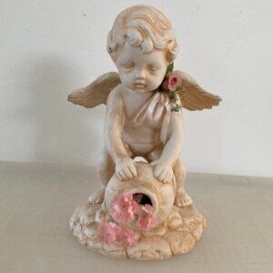 Sculpture of Cherub Leaning Over Planter